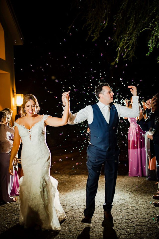 Garden Villa: Celebratory Sparklers: Bride and Groom Entering the Party