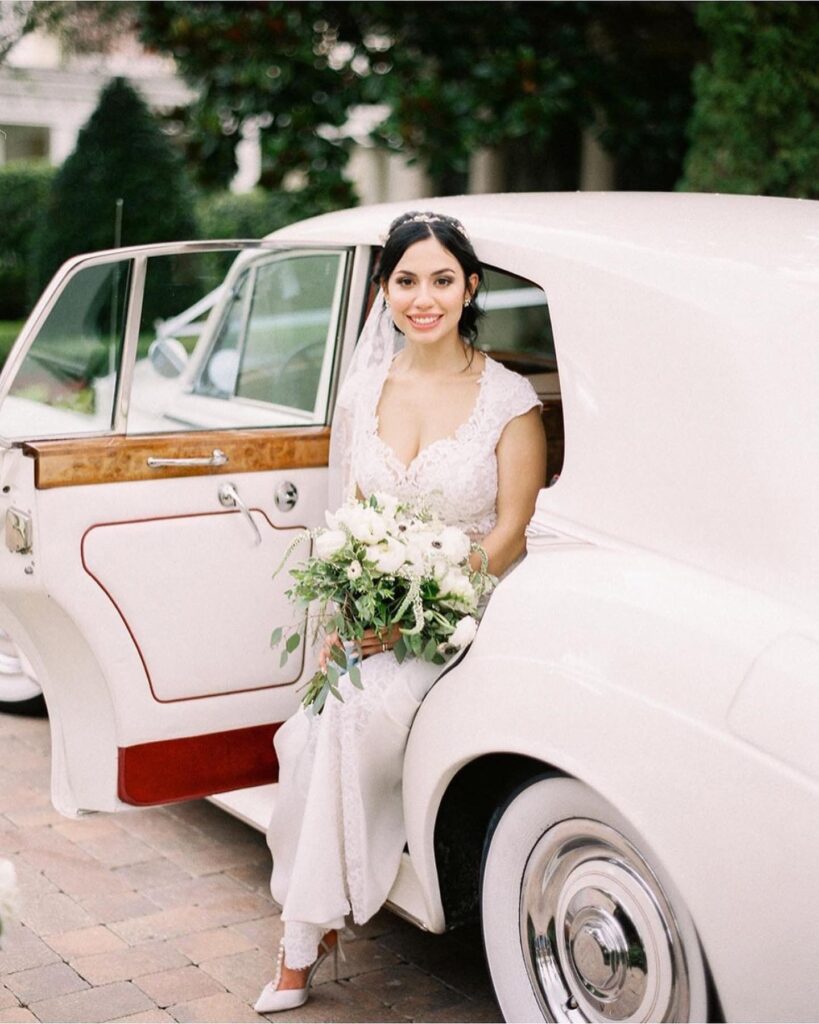 Elegant Bride Stepping out of Classic Ride from VIP Wedding Transportation