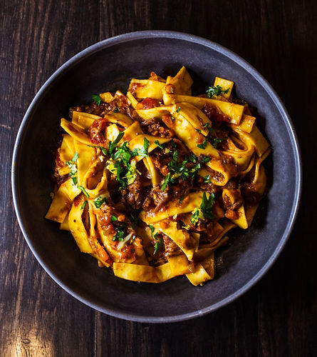 Gourmet Pasta and Beef Dish with Green Garnish