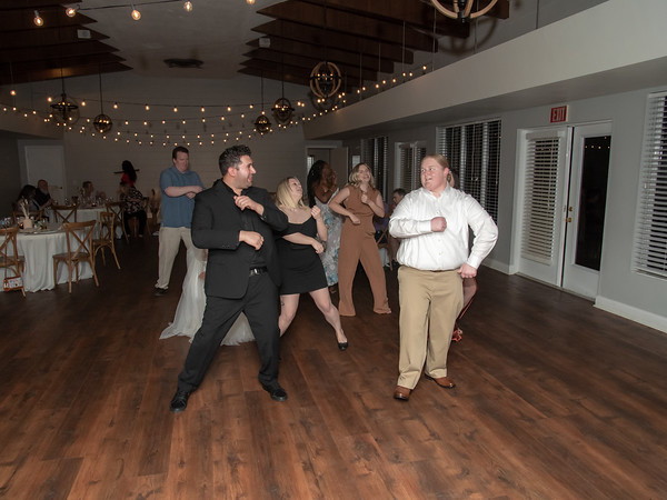 Doing The Macarena With DJ Icon On The Garden Villa Dance Floor At All Inclusive Weddings Orlando