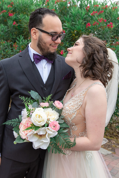 Happy Couple In Love With Bride Holding Flowers From The Flower Studio At All Inclusive Weddings Orlando