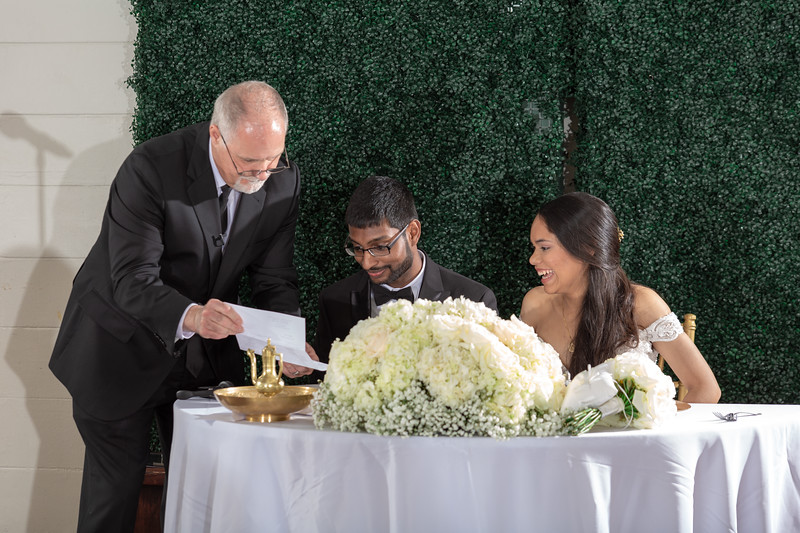 Joyful conversation between Ray and a happy couple after their wedding at All Inclusive Weddings Orlando.