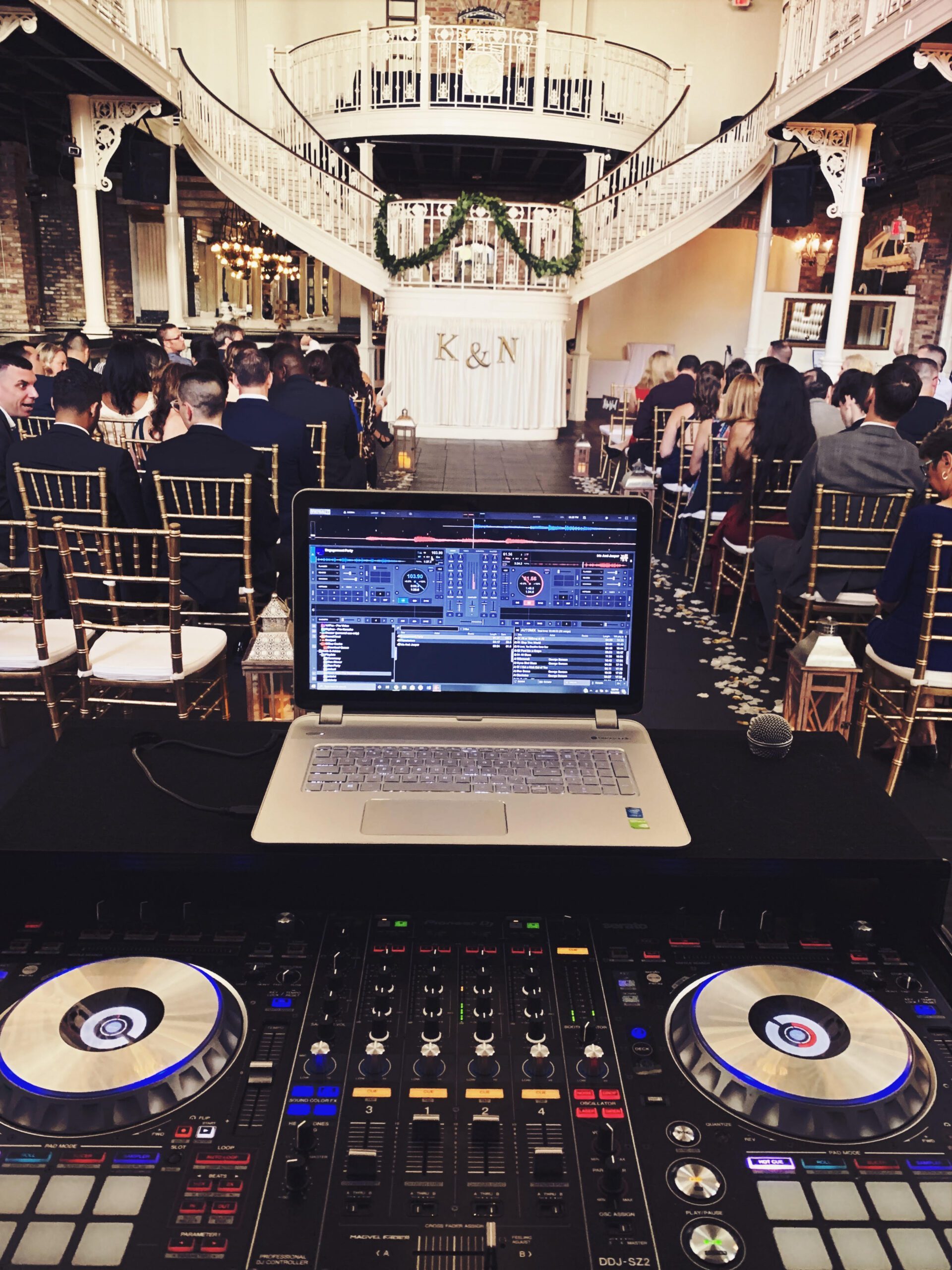 All Inclusive Weddings Orlando With DJ Icon Setting Up In Back Of Wedding