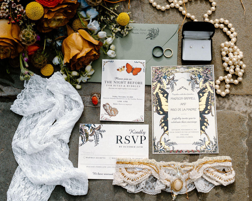 Elegant display of RSVP letters and wedding stationary by Simply Enchanted