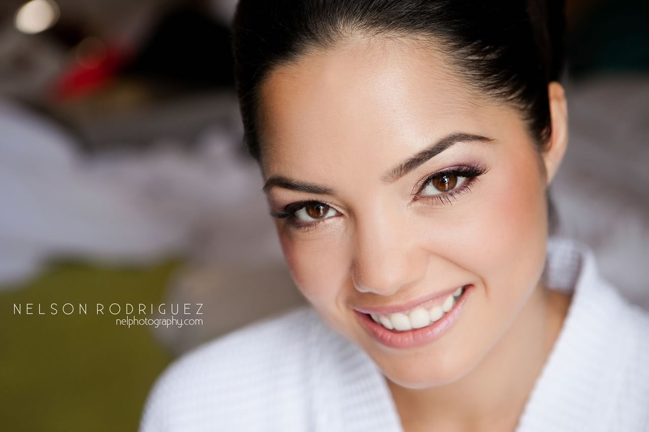 Bride with Stunning Down-Do Hairstyle by Kristy's Artistry Design Team