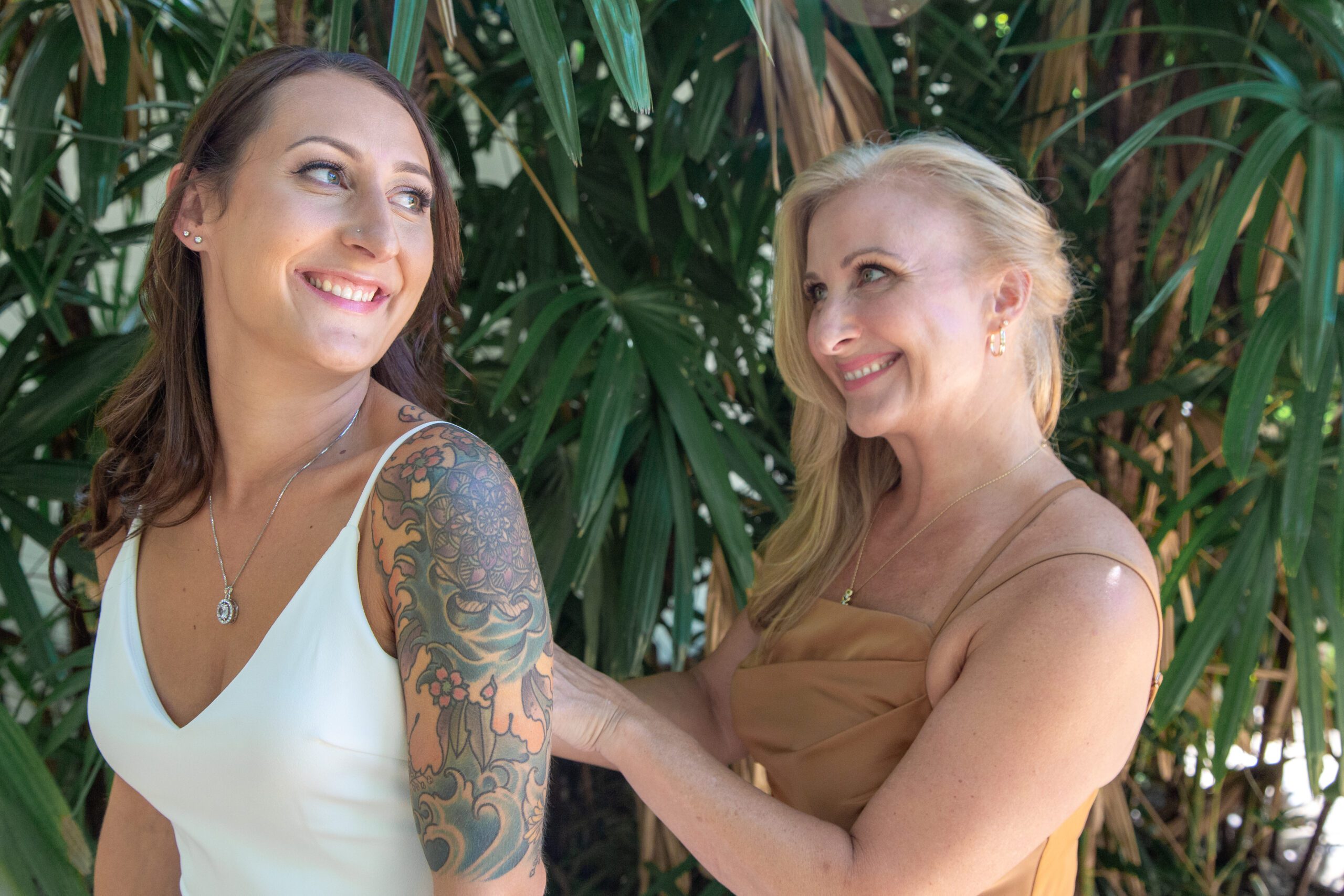 All Inclusive Weddings Orlando - Tender Moment: Mother Adjusting Bride's Dress