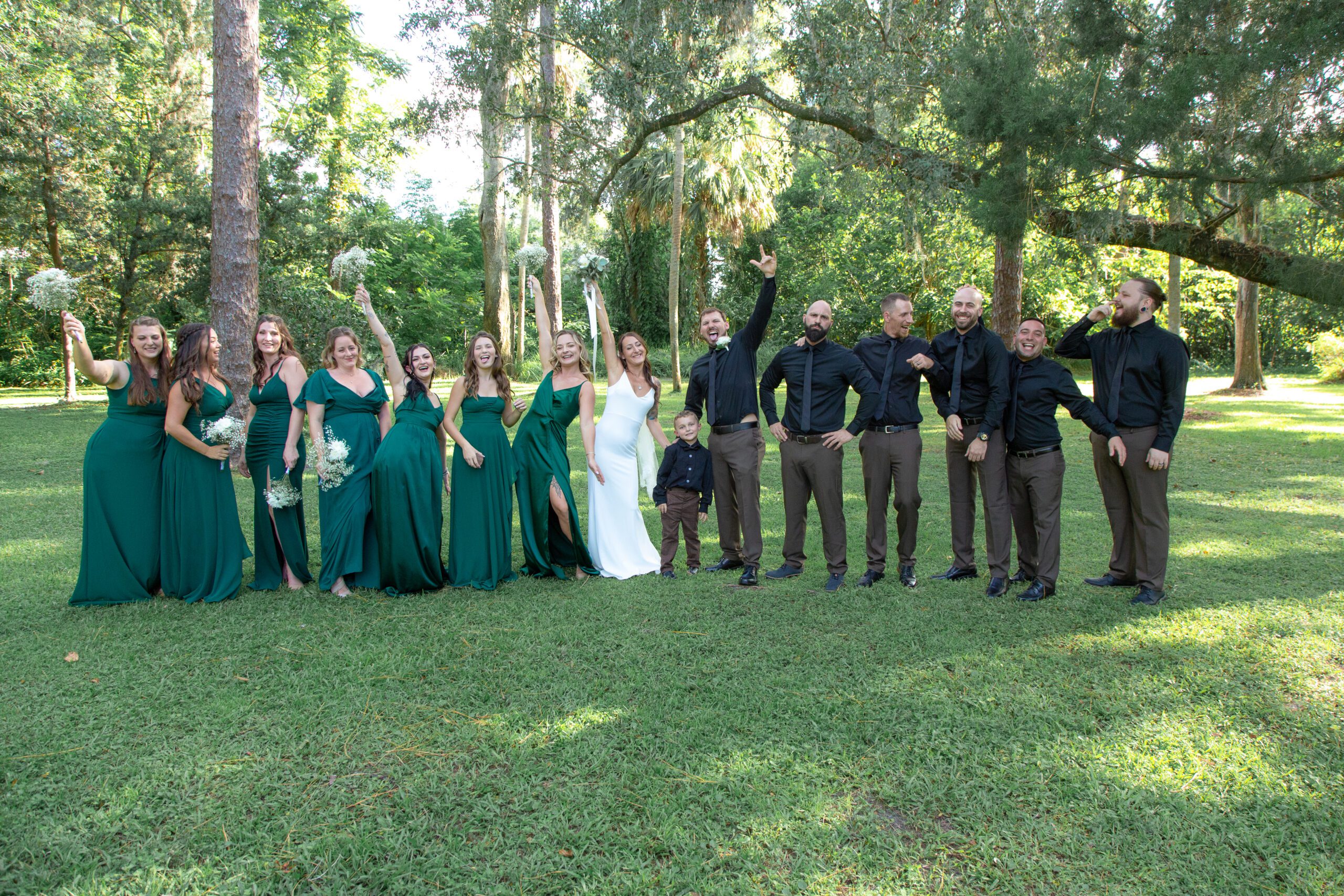 All Inclusive Weddings Orlando - Newlyweds and Bridal Party Photo Moment