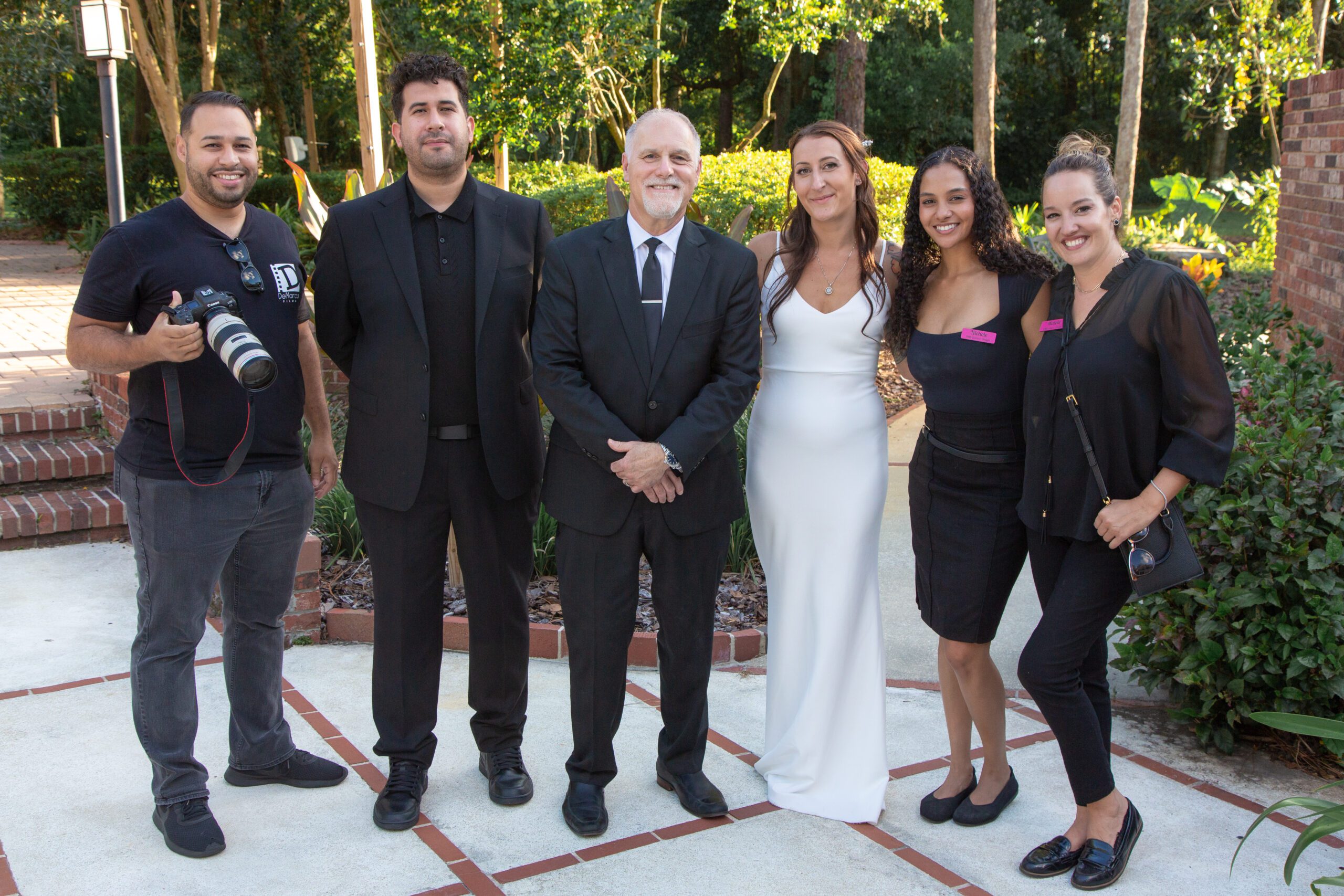 All Inclusive Weddings Orlando - Bride with Officiant, Planners, DJ, and Photographer